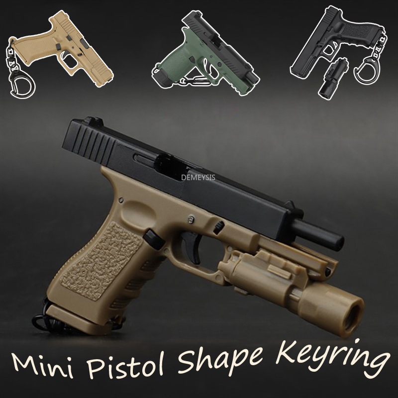 Home Decor Magazine - Porte-clés réaliste en forme de mini-pistolet,